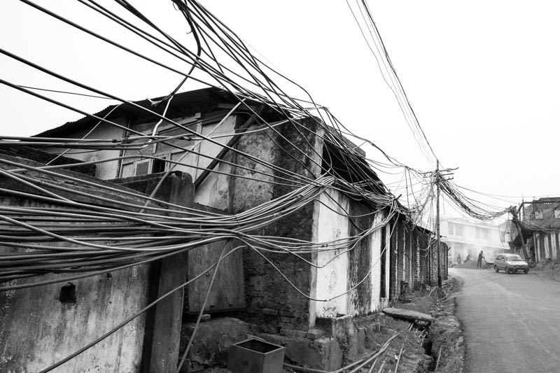 Human Right to Water in Nagaland - A bunch of private water cables running across a long row of houses in the capital city Kohima